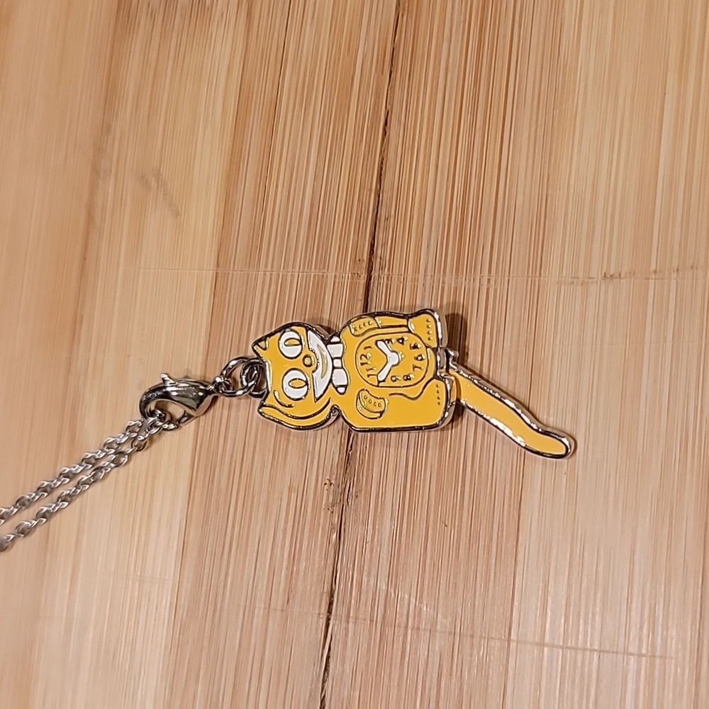 Majestic Yellow Kit-Cat Klock clock clip on charm necklace